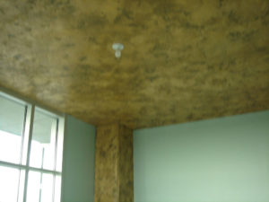 Concrete overlay ceiling by Bella Tucker