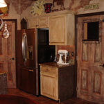 Melamine Cabinets with a Tobacco Stain Faux Finish by Bella Tucker Decorative Finishes