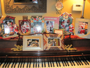 Last year the piano displayed the kids' Santa photos.