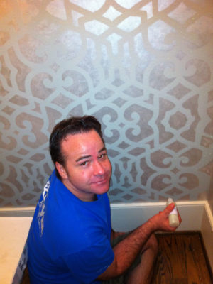 Brooks Tucker working on the Southern Living Powder Bath stencil design