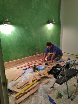 Installing wood wall using tongue and groove flooring