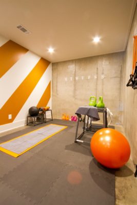 HGTV Smart Home Workout room with funky orange stripes
