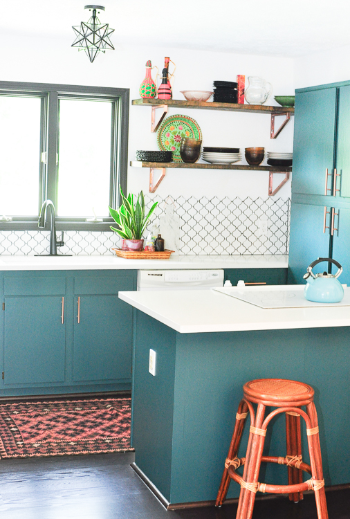 black window updated kitchen with Sherwin Williams 0064 Blue Peacock Cabinets- photo by Samantha Nelson Photography