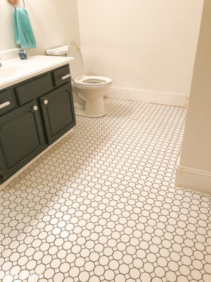 Octagon and dot porcelain tile with charcoal grout