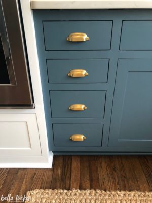 Nocturnal Gray paint by Benjamin Moore paired with brass hardware.