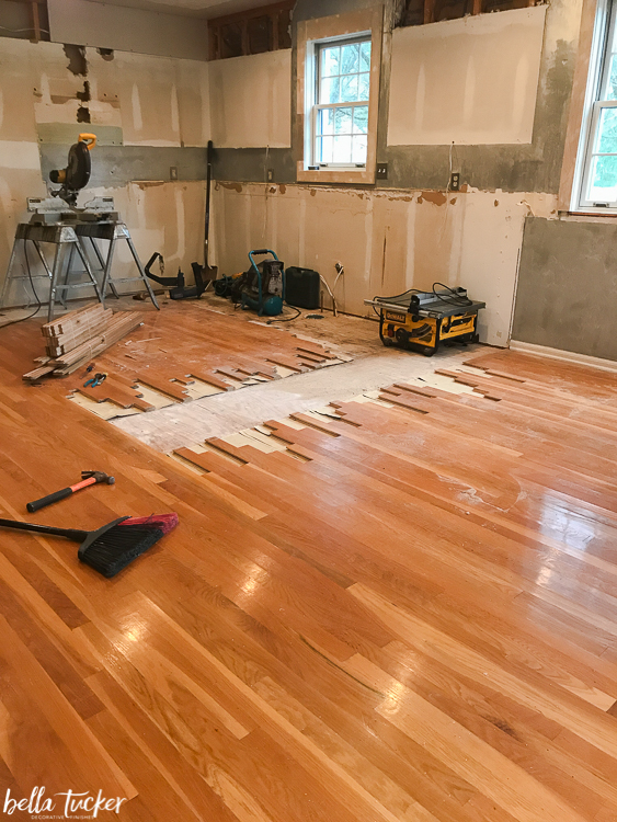 cut out floor for lacing in new wood