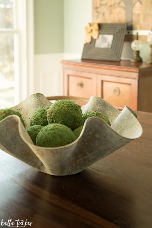 moss balls in vintage bowl