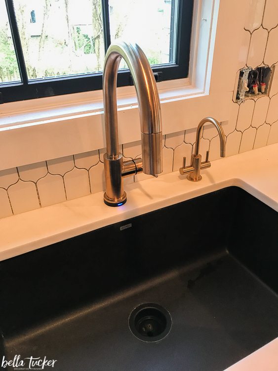 Delta Trinsic touchless faucet in champagne bronze